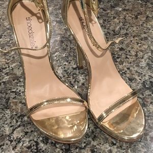 Strappy gold high heels